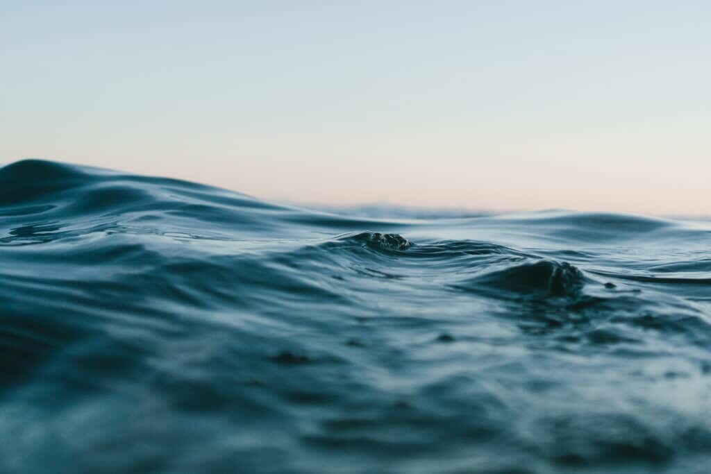 body of water under blue and white skies stockpack pexels scaled
