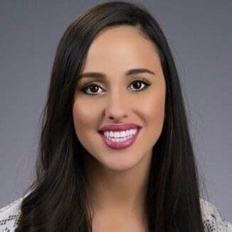 Shaylynn Hayes-Raymond, author of Cognitive Behavioral Therapy (CBT) for Misophonia, smiling